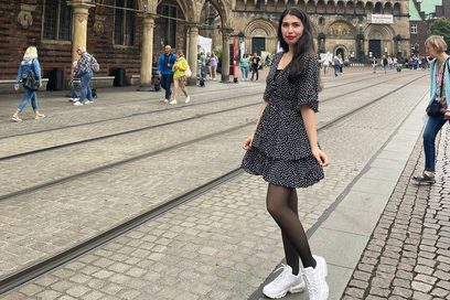 Fatemeh Raeika Vahedi poses in front of a church.